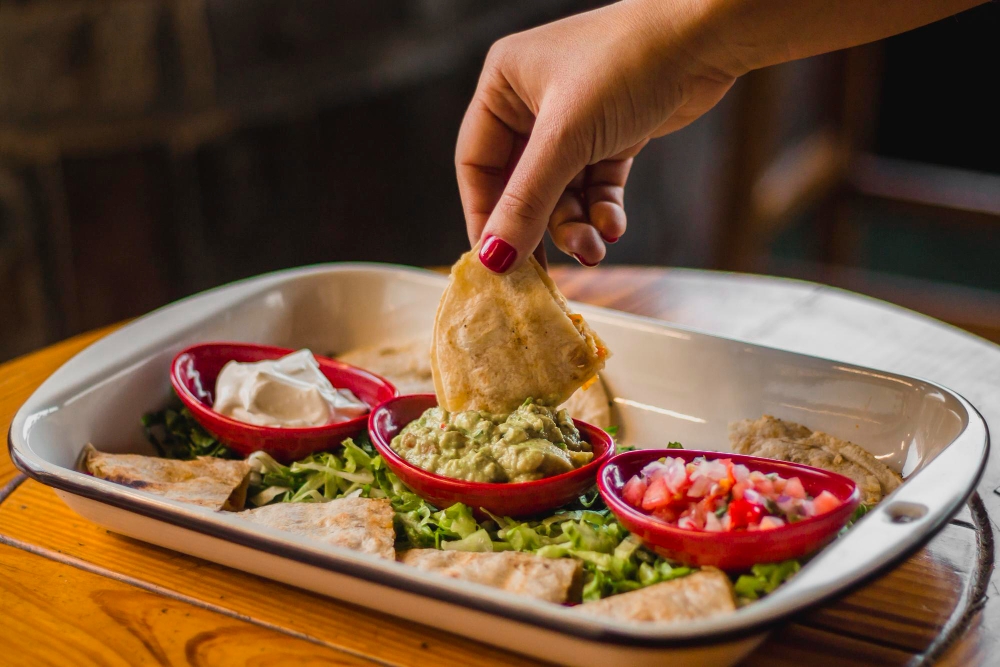 Where to Find Butter Chicken Nachos in Denver